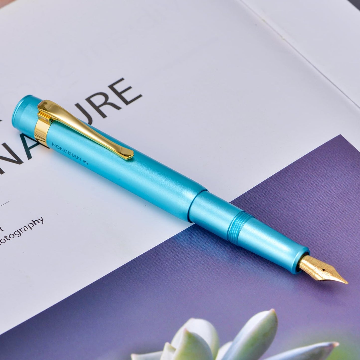 HONG DIAN M2 Black Forest Mini Fountain Pen, Medium Soft Nib & Sleek Shape Aluminium Short Pocket Travel Pen (Lake Blue)