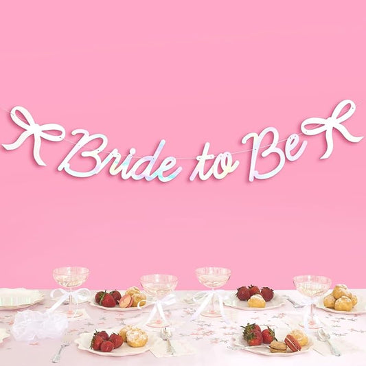 xo, Fetti Bride to Be Bow Banner Iridescent Foil + Pink Glitter , 5 Ft. | Bachelorette Party Decoration, Tying the Knot Bride Bach Decor, Bridesmaid Favor, Engagement Gift, Bridal Shower Supplies, Photobooth Backdrop