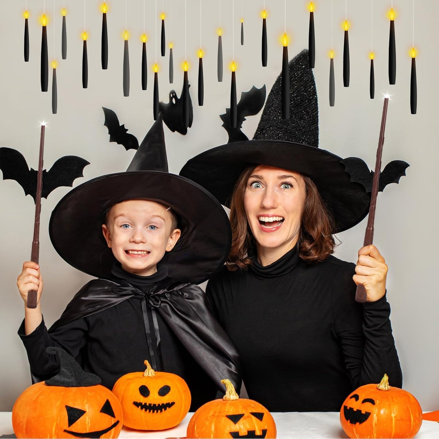 NURADA Floating Candles with Wand Remote Timer - 24 Pcs Magic LED Hanging Flameless Taper Candles Flickering Battery Operated for Birthday Theme Party Holiday Home Halloween Decor - Black